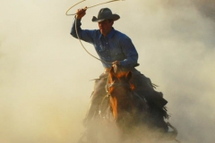Dust Storm - Cowboy Photography by Jody Miller